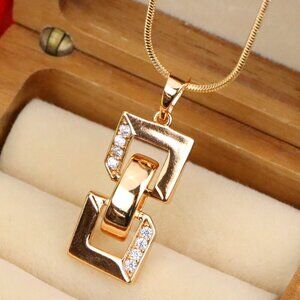 "Rose Gold Geometric Link Pendant with Sparkling Accents, XPPT1746